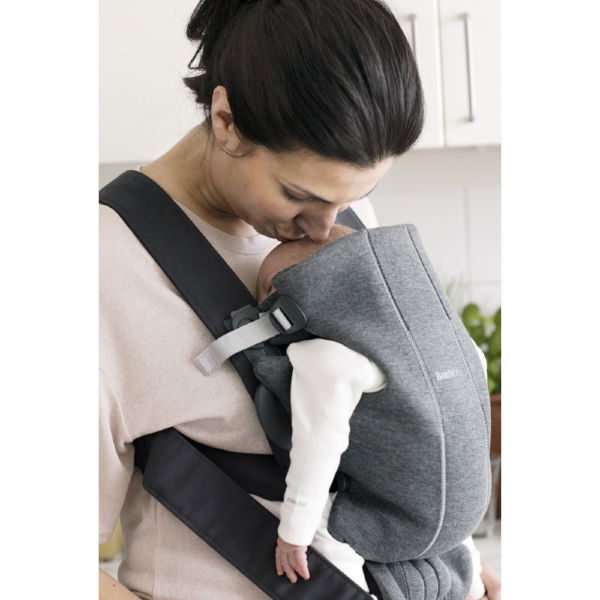 babybjorn bjorn baby carrier mini ergonomic easy newborn baby carrier uk mum wearing lifestyle