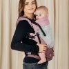 Side view of woman carrying baby facing towards her in Ombre Pink Lenny Lamb LennyUpgrade mesh baby carrier