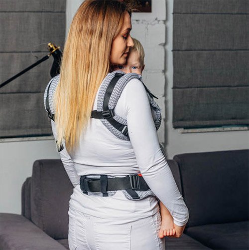 Back view of woman carrying baby in Lenny Lamb LennyUpgrade mesh baby carrier in grey Selenite fabric