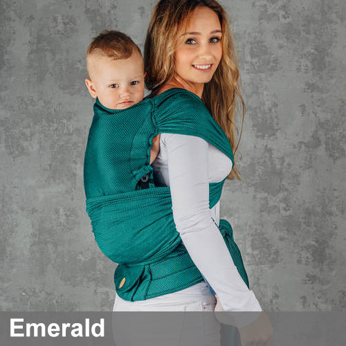 Woman carries toddler on her back in Lenny Lamb LennyHybrid Preschool toddler carrier in Emerald, side view